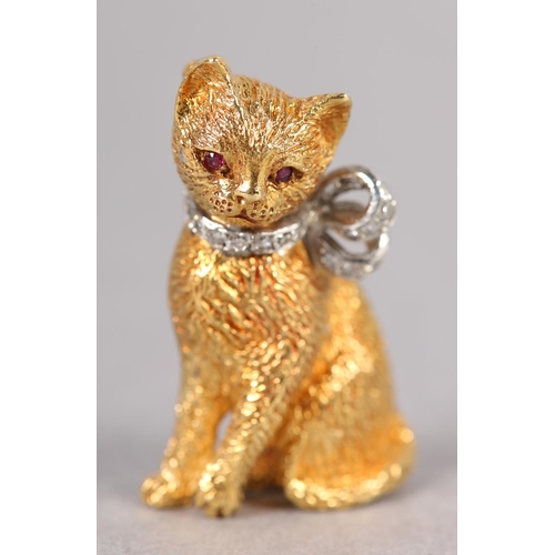 352 - A RUBY AND DIAMOND CAT BROOCH in 18ct yellow and white gold c1971, seated in detailed half relief wi... 