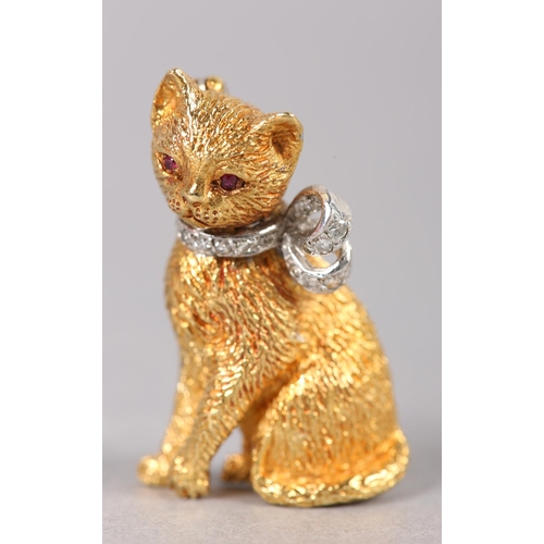 352 - A RUBY AND DIAMOND CAT BROOCH in 18ct yellow and white gold c1971, seated in detailed half relief wi... 