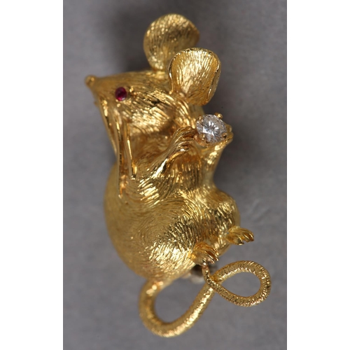 354 - A RUBY AND DIAMOND MOUSE BROOCH c1970, slightly stylised, seated in detailed half relief, set to the... 