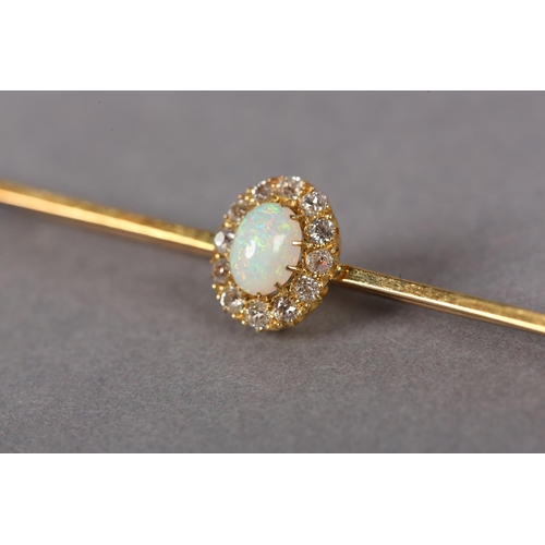 361 - AN EDWARD VII OPAL AND DIAMOND CLUSTER BAR BROOCH in 15ct gold, the oval cabochon opal within a surr... 