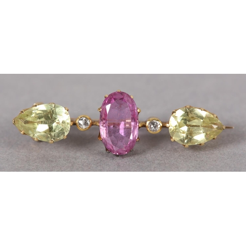 364 - A VICTORIAN PINK TOPAZ, DIAMOND AND CHRYSOBERYL BAR BROOCH in 15ct gold, claw set to the center with... 