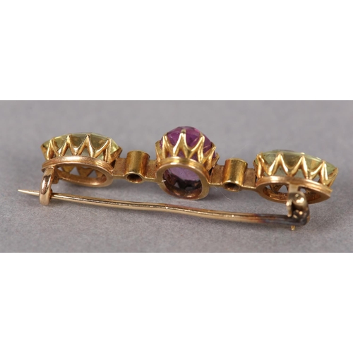 364 - A VICTORIAN PINK TOPAZ, DIAMOND AND CHRYSOBERYL BAR BROOCH in 15ct gold, claw set to the center with... 