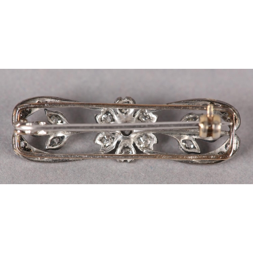 365 - AN EDWARD VII DIAMOND CLUSTER BROOCH in silver, the foliate head and pierced surround set with Old E... 