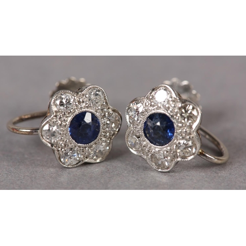 367 - A PAIR OF SAPPHIRE AND DIAMOND CLUSTER EARRINGS c1950 in 9ct white gold, each millegrain set to the ... 