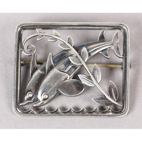 391 - A GEORG JENSEN 251 SILVER DOLPHIN BROOCH designed by Arno Malinowski, the pierced pair of dolphins w... 