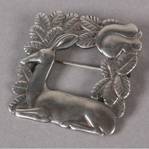 392 - A GEORG JENSEN 318 SILVER DEER AND SQUIRREL BROOCH designed by Arno Malinowski, the pierced recumben... 