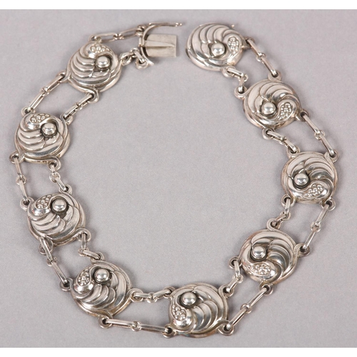 395 - A GEORG JENSEN 19 SILVER NECKLACE, the circular leaf curl and berry links joined by fetter links, si... 