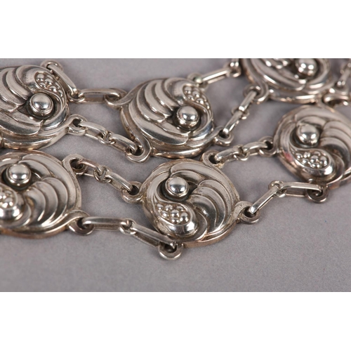 395 - A GEORG JENSEN 19 SILVER NECKLACE, the circular leaf curl and berry links joined by fetter links, si... 