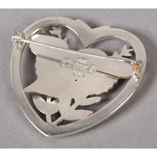 396 - A GEORG JENSEN 239 SILVER HEART SHAPED DOVE BROOCH by Arno Malinowski, the pierced dove in flight wi... 