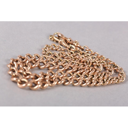 345 - A NECKCHAIN in 9ct rose gold, graduated curb links with swivel fasteners and safety chain approximat... 