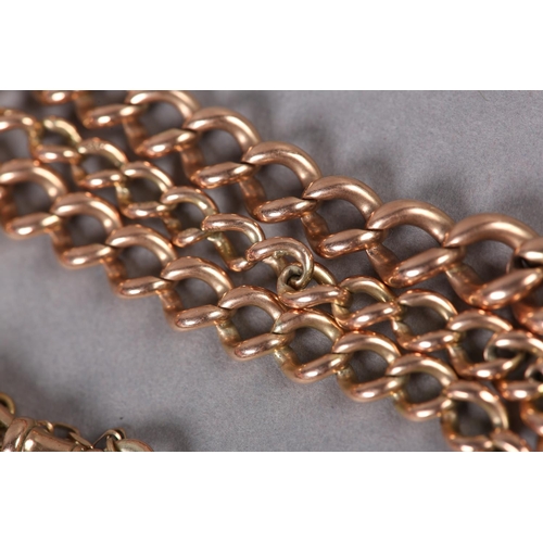 345 - A NECKCHAIN in 9ct rose gold, graduated curb links with swivel fasteners and safety chain approximat... 