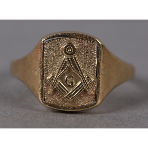 383 - A MASONIC SIGNET RING in 9ct gold, c1970, the rectangular face swivels within broad shoulders, monog... 