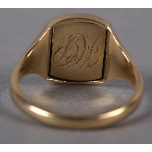 383 - A MASONIC SIGNET RING in 9ct gold, c1970, the rectangular face swivels within broad shoulders, monog... 