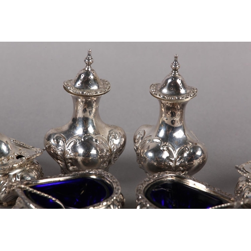 340 - AN EDWARD VII SILVER SIX PIECE COMPOSITE CRUET SET Chester 1903/ 1904 for Colen Hewer Cheshire, balu... 