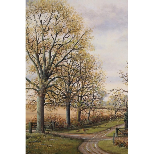 422 - ARR STANLEY G ANDERSON (20th Century), Fairstead, Essex, tree lined lane, hayricks and cart, oil on ... 