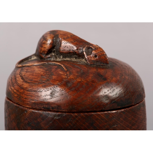 453 - THOMPSON OF KILBURN 'MOUSEMAN', An early oak box and cover, ovoid, the cover carved in relief with a... 