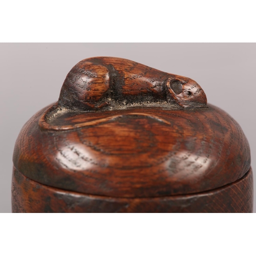 453 - THOMPSON OF KILBURN 'MOUSEMAN', An early oak box and cover, ovoid, the cover carved in relief with a... 