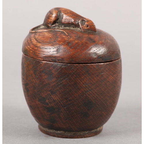 453 - THOMPSON OF KILBURN 'MOUSEMAN', An early oak box and cover, ovoid, the cover carved in relief with a... 