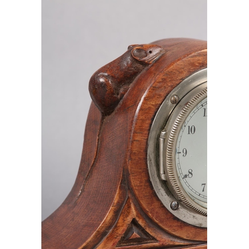 454 - THOMPSON OF KILBURN 'MOUSEMAN', An early oak mantel clock, of arched outline, carved in relief with ... 