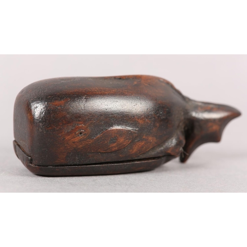 205 - A MID 19TH CENTURY TREEN SNUFF BOX CARVED AS A WHALE, with sliding lid to underside incised 'R.H 185... 