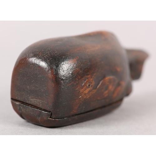 205 - A MID 19TH CENTURY TREEN SNUFF BOX CARVED AS A WHALE, with sliding lid to underside incised 'R.H 185... 