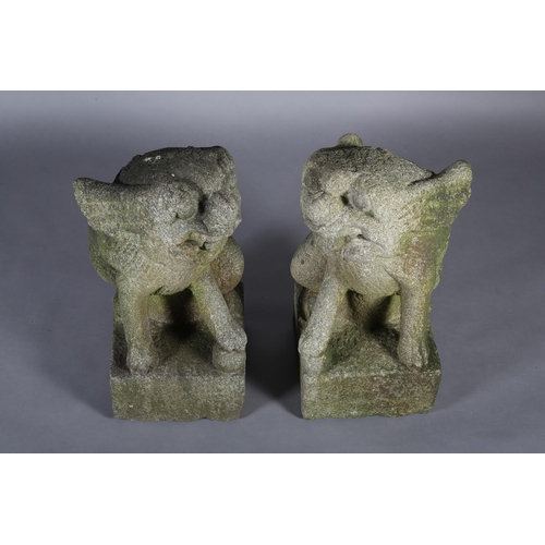 292 - A PAIR OF LATE 19TH CENTURY CARVED STONE GARDEN STATUES modelled as Dogs of Fo both holding a ball, ... 