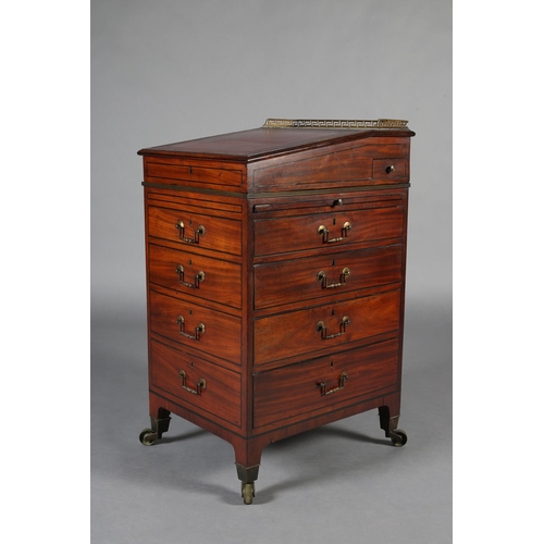 481 - A LATE REGENCY MAHOGANY AND EBONY LINE INLAID DAVENPORT, having a brass Greek key gallery and red le... 