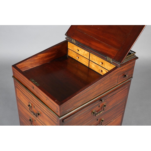 481 - A LATE REGENCY MAHOGANY AND EBONY LINE INLAID DAVENPORT, having a brass Greek key gallery and red le... 