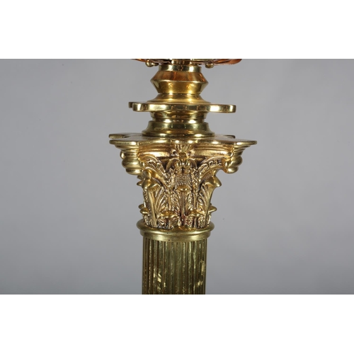 173 - A LATE 19TH/EARLY 20TH CENTURY BRASS STANDARD OIL LAMP, converted to electricity, having a copper re... 