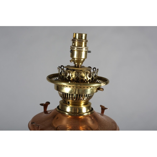 173 - A LATE 19TH/EARLY 20TH CENTURY BRASS STANDARD OIL LAMP, converted to electricity, having a copper re... 