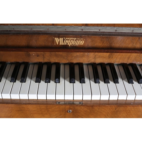 452 - AN ART DECO EAVESTAFF PIANETTE MINIPIANO ROYAL, walnut case, having a raised back of arched profile ... 