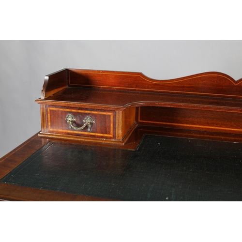 483 - AN EDWARD VII MAHOGANY AND SATINWOOD BANDED DESK, having a raised back with ogee arch, two small dra... 