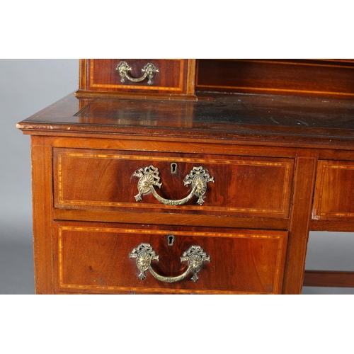 483 - AN EDWARD VII MAHOGANY AND SATINWOOD BANDED DESK, having a raised back with ogee arch, two small dra... 