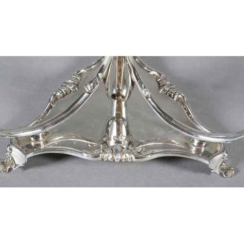 335 - AN EDWARD VII SILVER EPERGNE, London 1909, Josiah Williams & Co, having a large central flute with p... 