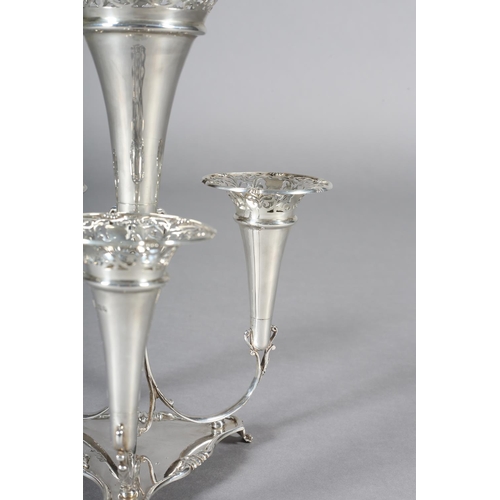 335 - AN EDWARD VII SILVER EPERGNE, London 1909, Josiah Williams & Co, having a large central flute with p... 