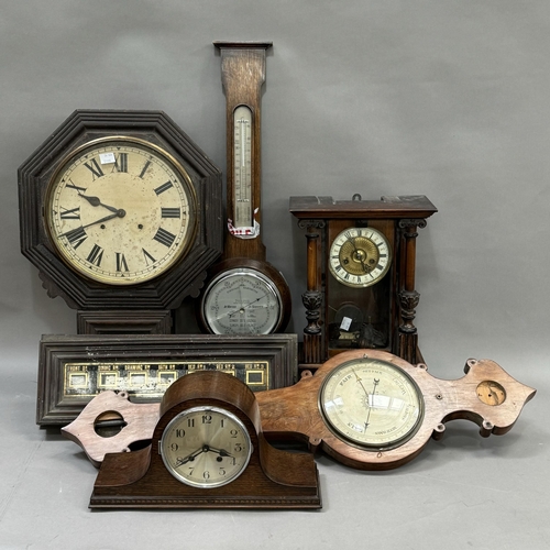 156 - A small collection of late 19th and early 20th clocks and barometer including a German wall strike c... 