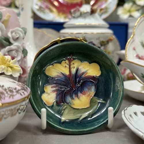 130 - A collection of flower clusters together with trinket dishes, plates etc by Minton, Royal Crown Derb... 