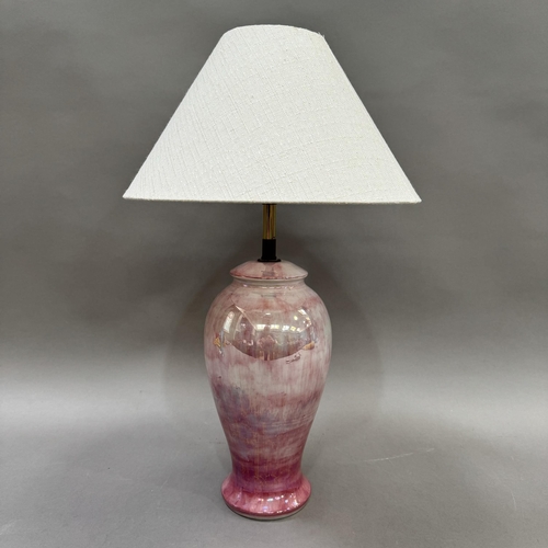 38 - A Moorcroft pink lustre lamp, the body of baluster form with impressed mark to base, 49cm high