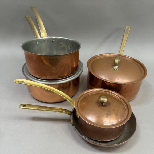 174 - A collection of three Tagus copper saucepans and lids of graduated size together with a frying pan a... 