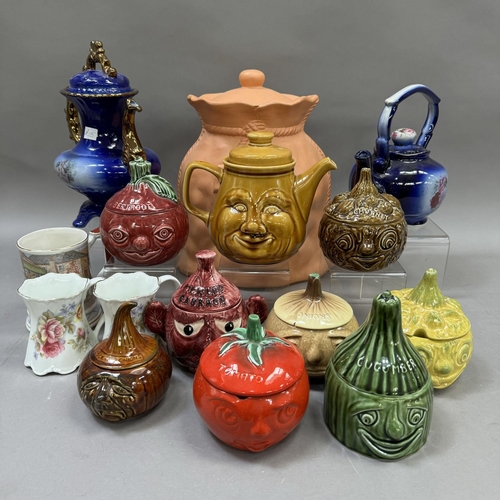 41 - A collection of Sylvac preserve pots, moulded teapots and a composite potato sack