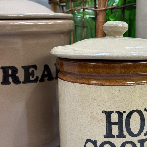 177 - Three green glass flagons with cork together with salt glazed  stoneware kitchenalia