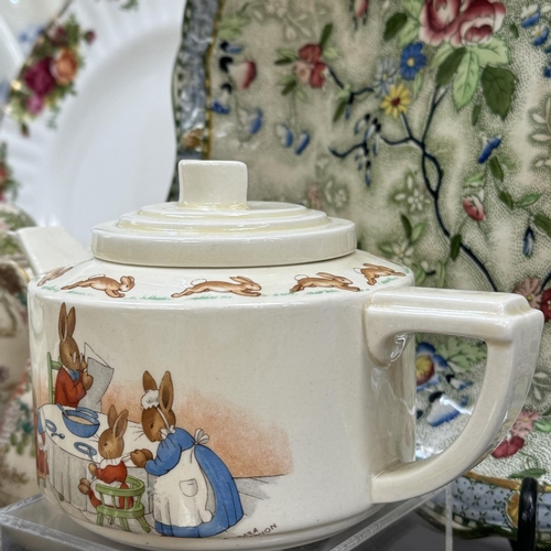 55 - A Bunnykins teapot, plates, jugs together with large oval meat plates, A Royal Albert plate etc