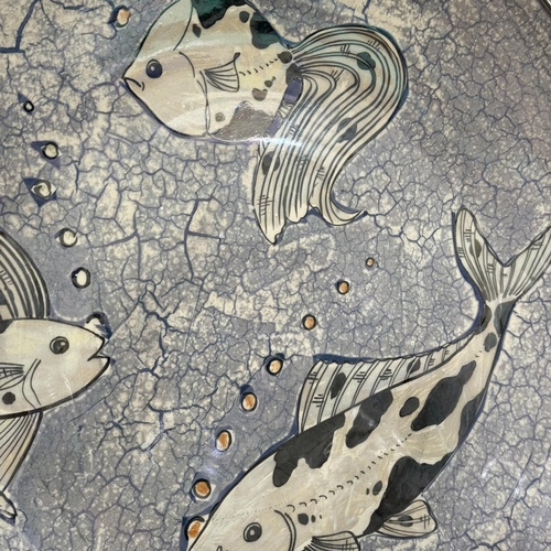 25 - Dean Sherwin for Moorland charger 'Silver Fish' painted with fish in lustre on a crackle ground, tog... 