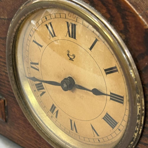 169 - An early 20th century oak mantle clock, a Tempus Fugit mantle clock and a Bulova wall clock