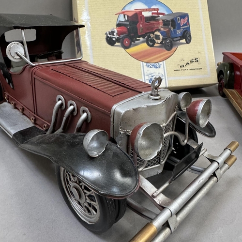 134 - A model of a Mercedes Benz 1920, a model of a Studebaker K-Model Indiana 1936, Corgi Bass Model T va... 