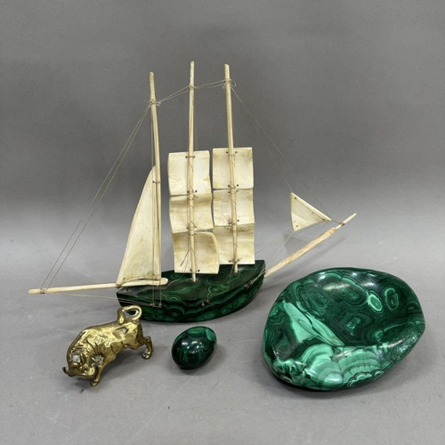 175 - A collection of agate including a moulded agate dish, a model of a boat with bone sails, an egg and ... 