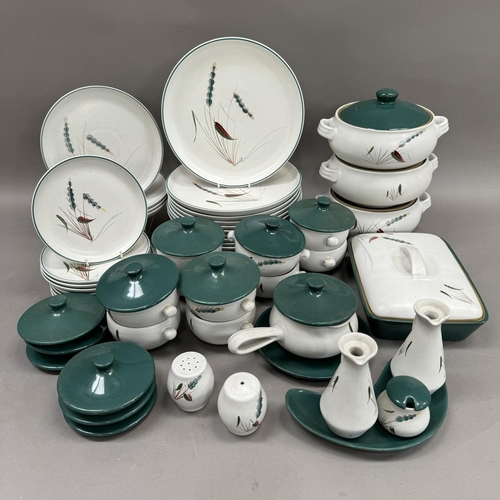 54 - A quantity of Denby Green wheat pattern dinnerware comprising twelve dinner plates, soup tureens, si... 