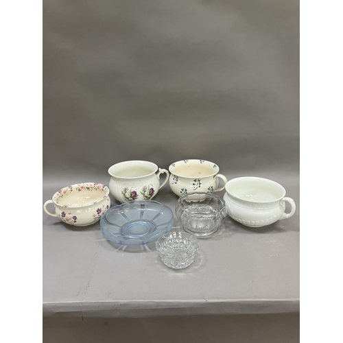 50 - Four ceramic chamber pots, a glass serving dish, a glass dessert dish and another