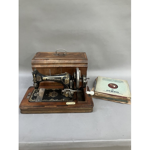 43 - A Frister and Rossman sewing machine 1377226, in oak carrying case