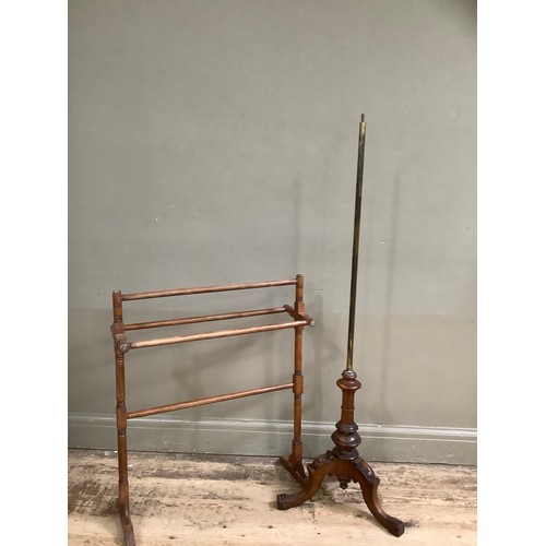 76 - A Victorian mahogany pole screen stand with carved legs together with a towel rail